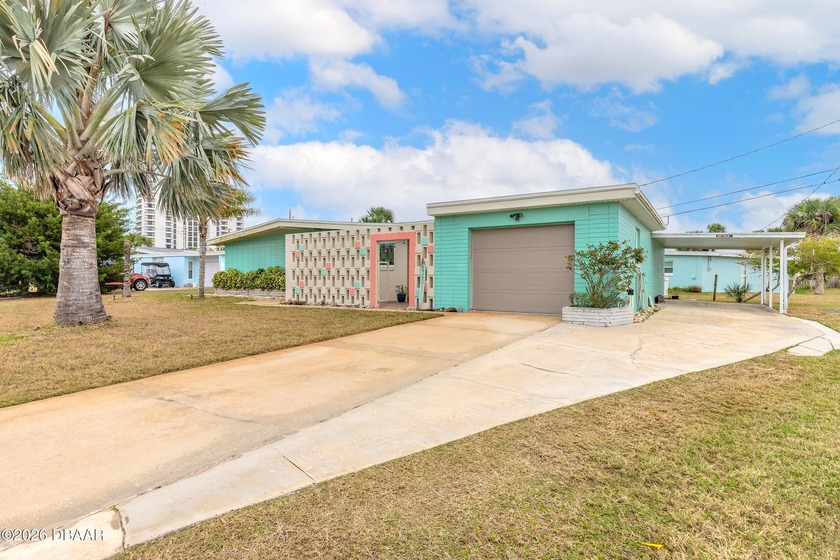 This mid-century modern retreat blends beach house charm with - Beach Home for sale in Port Orange, Florida on Beachhouse.com