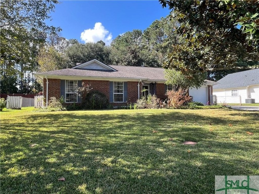 Welcome to this well-maintained 3 bedroom, 2 bathroom brick home - Beach Home for sale in Richmond Hill, Georgia on Beachhouse.com