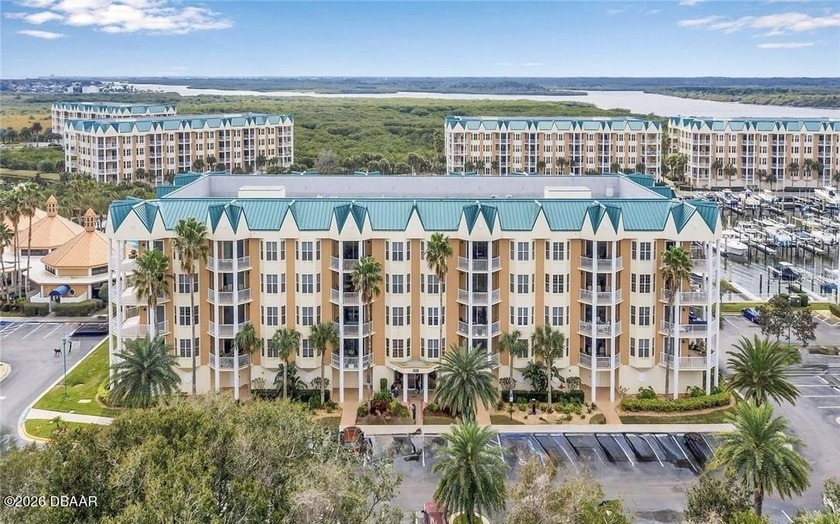 Bright open plan corner unit has TWO balconies overlooking woods - Beach Condo for sale in Ponce Inlet, Florida on Beachhouse.com
