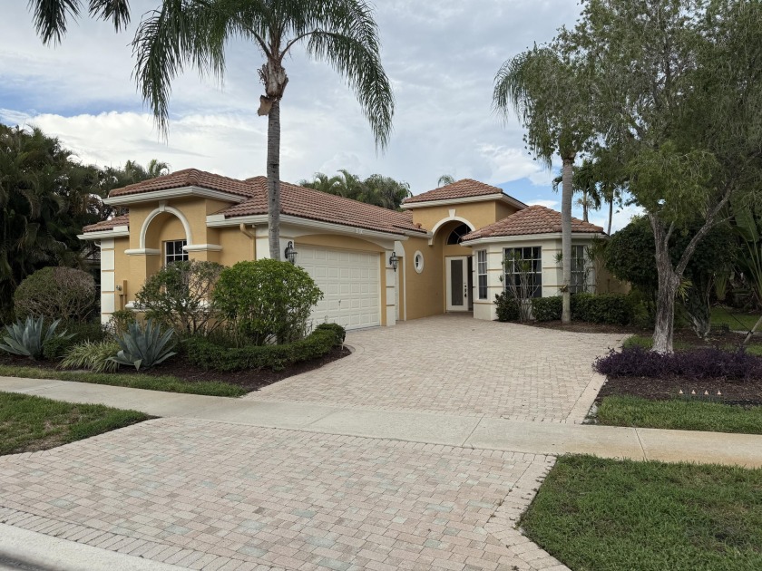 This 3-bedroom plus den, 3.5-bath home is located in the - Beach Home for sale in Lake Worth, Florida on Beachhouse.com