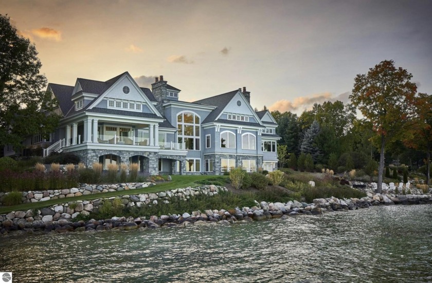 Luxury and elegance await you in this stunning Lake Michigan - Beach Home for sale in Traverse City, Michigan on Beachhouse.com