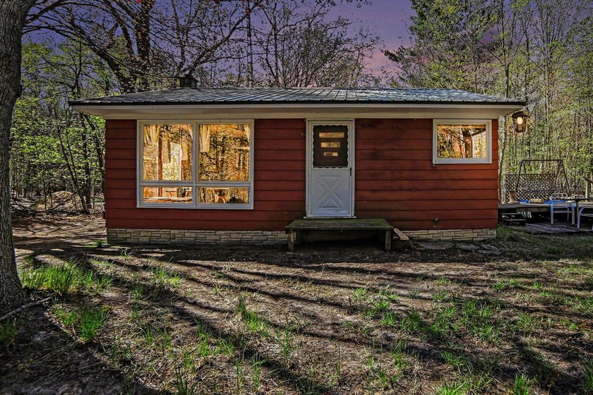 Check out this 2 bed, 1 bath cottage on 1.34 acres. Very close - Beach Home for sale in Montague, Michigan on Beachhouse.com