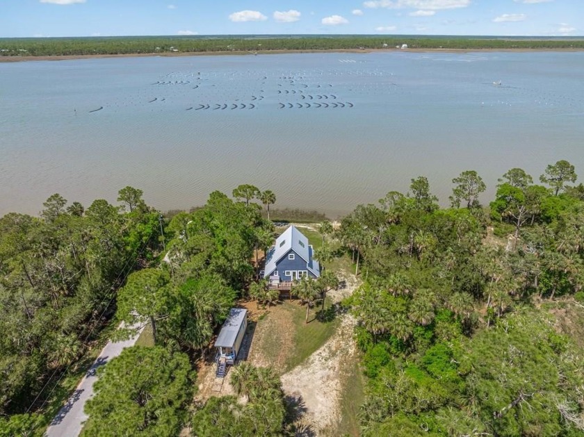 Welcome to a true one-of-a-kind property on the pristine waters - Beach Home for sale in Port St Joe, Florida on Beachhouse.com