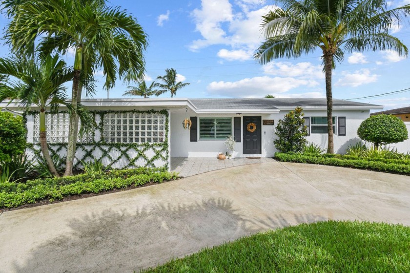 Welcome to your dream waterfront retreat! This charming home is - Beach Home for sale in Boynton Beach, Florida on Beachhouse.com