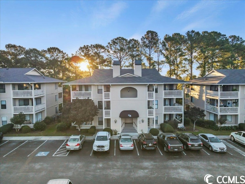 This stunning one-bedroom, one-bathroom end unit is nestled - Beach Condo for sale in Little River, South Carolina on Beachhouse.com