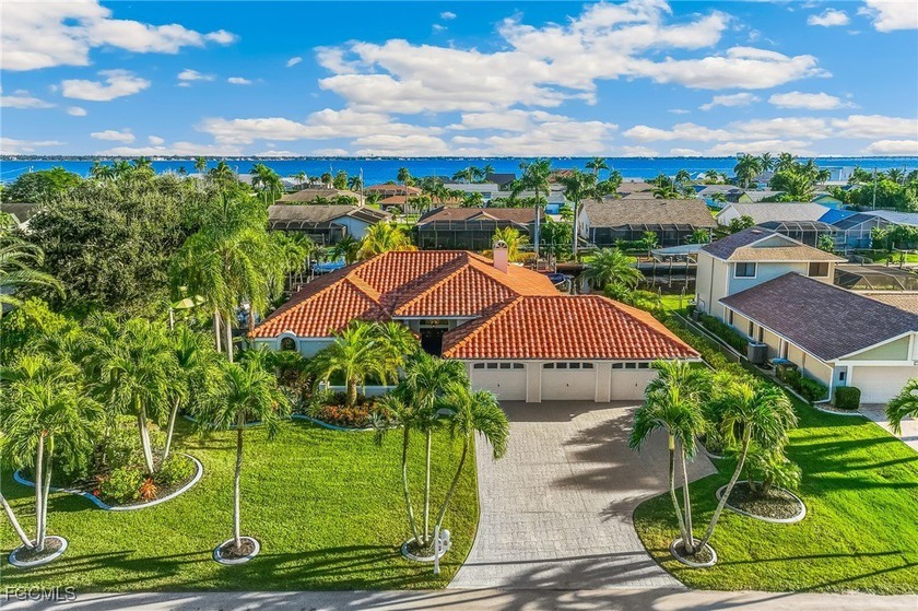 Introducing a rare and exceptional triple-lot masterpiece with - Beach Home for sale in Cape Coral, Florida on Beachhouse.com