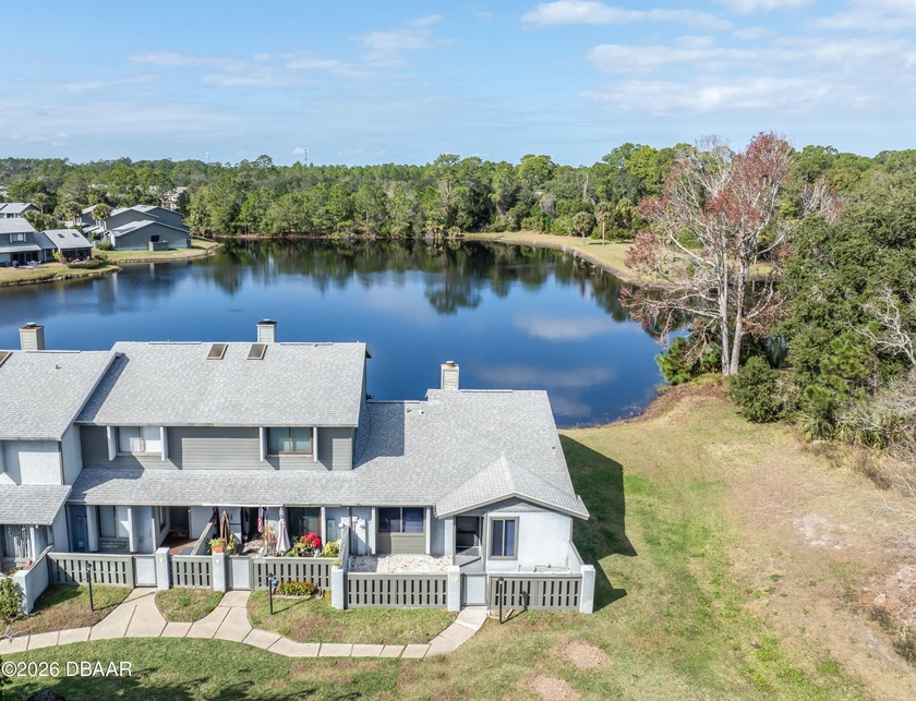 EXCEPTIONAL ONE-STORY LAKEFRONT LIVING WITH STUNNING VIEWS! - Beach Condo for sale in Ormond Beach, Florida on Beachhouse.com