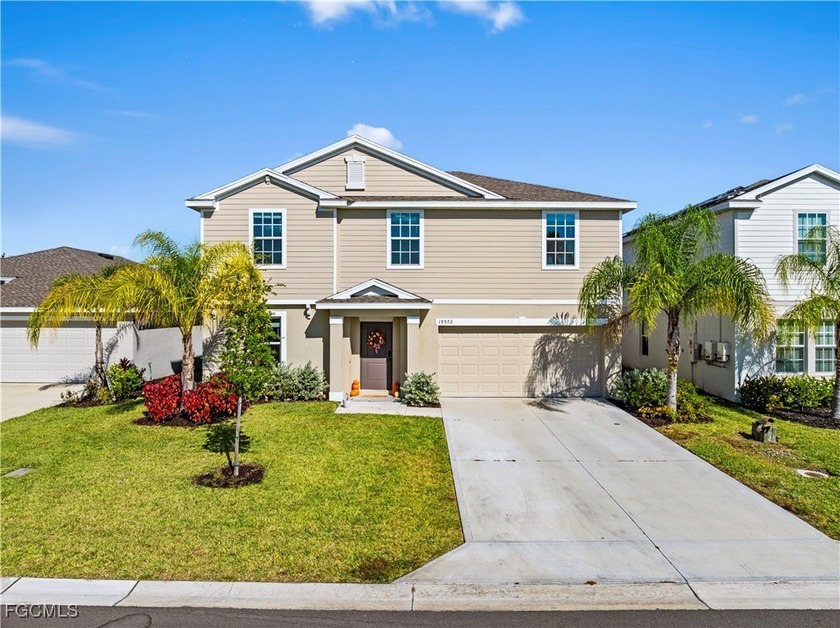Welcome to this stunning 2-story home featuring 5 bedrooms and 2 - Beach Home for sale in Lehigh Acres, Florida on Beachhouse.com