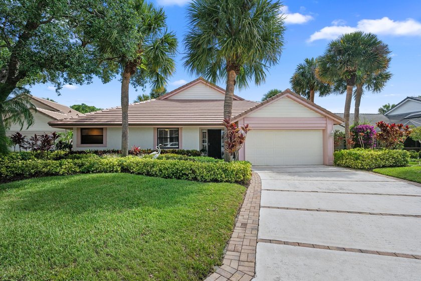 Welcome to this exceptional 3-bedroom, 2.5-bath home located on - Beach Home for sale in Jupiter, Florida on Beachhouse.com