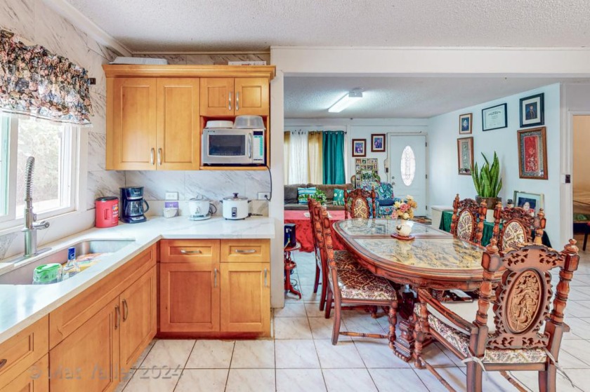 Welcome to this expansive 6-bedroom, 4-bathroom home in the - Beach Home for sale in Kapolei, Hawaii on Beachhouse.com