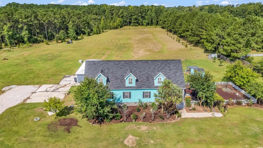 Welcome to this stunning 5-bedroom, 3-bathroom home situated on - Beach Home for sale in Longs, South Carolina on Beachhouse.com