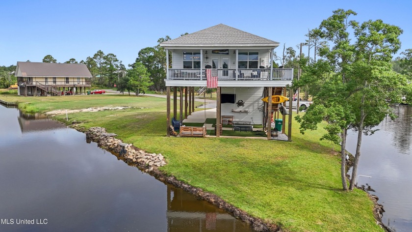 Fish from the deck of this waterfront home with water on two - Beach Home for sale in Bay Saint Louis, Mississippi on Beachhouse.com
