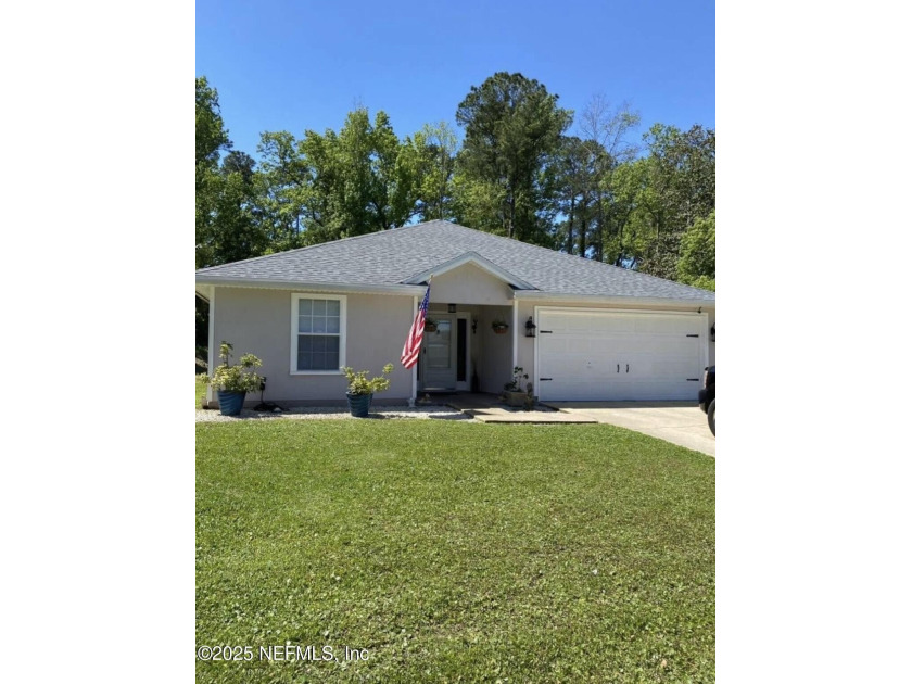 Welcome home to this inviting 3BR/2BA property nestled in the - Beach Home for sale in Green Cove Springs, Florida on Beachhouse.com