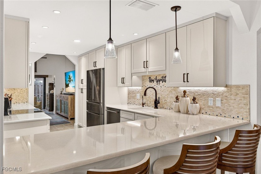 WOW!...This beautifully updated villa offers a bright, open - Beach Home for sale in Fort Myers, Florida on Beachhouse.com