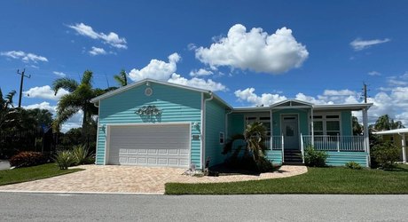 This beautiful home with a 2-car garage features a split 3 - Beach Home for sale in Punta Gorda, Florida on Beachhouse.com