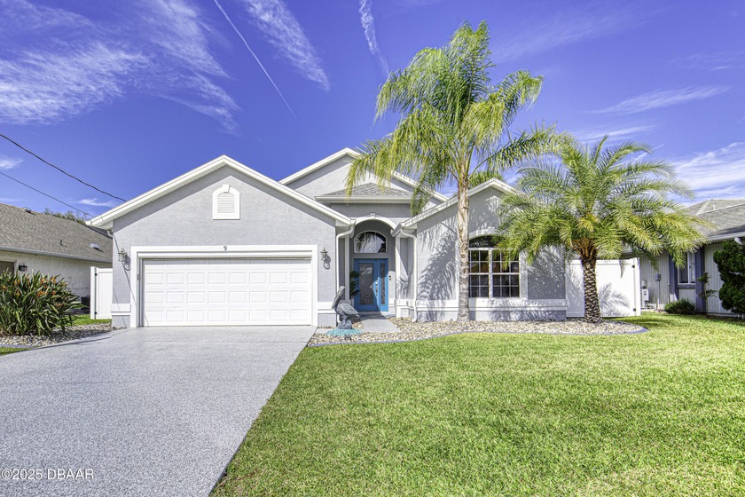 Welcome to this light and bright waterfront home tucked away on - Beach Home for sale in Palm Coast, Florida on Beachhouse.com