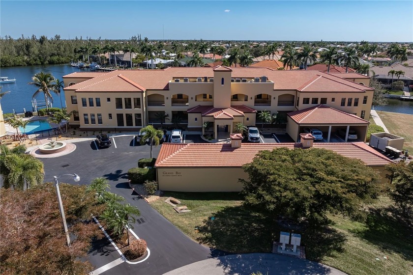 WATERFRONT CONDO IN PUNTA GORDA ISLES WITH DEEDED DOCK - - Beach Condo for sale in Punta Gorda, Florida on Beachhouse.com