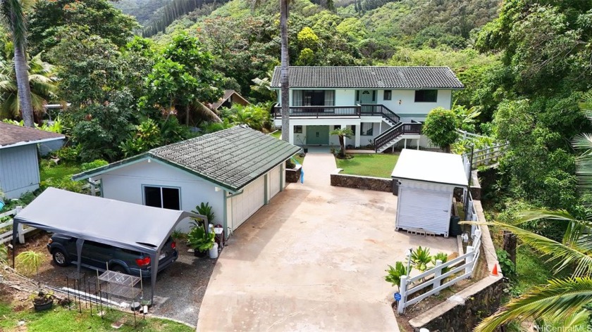 Featuring a gated entry for privacy, the home boasts - Beach Home for sale in Hauula, Hawaii on Beachhouse.com