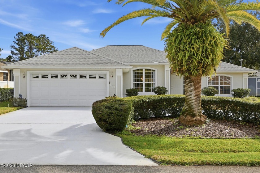 Welcome home to this inviting ranch-style residence offering 3 - Beach Home for sale in Palm Coast, Florida on Beachhouse.com