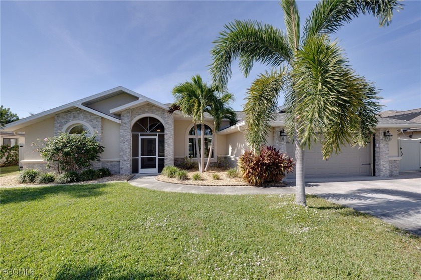 Welcome to this beautifully updated 3 bedroom 2 bathroom, 2 car - Beach Home for sale in Cape Coral, Florida on Beachhouse.com