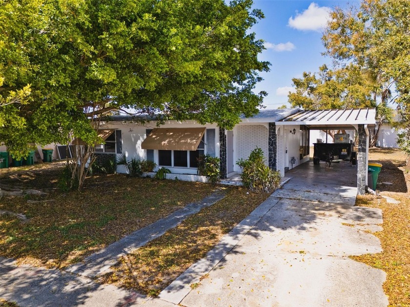 Welcome to 22278 Augusta Ave! This charming home offers a - Beach Home for sale in Port Charlotte, Florida on Beachhouse.com