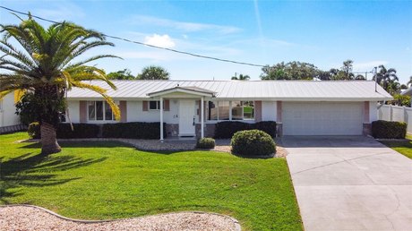 Waterfront paradise in Port Charlotte! This 2-bedroom - Beach Home for sale in Port Charlotte, Florida on Beachhouse.com