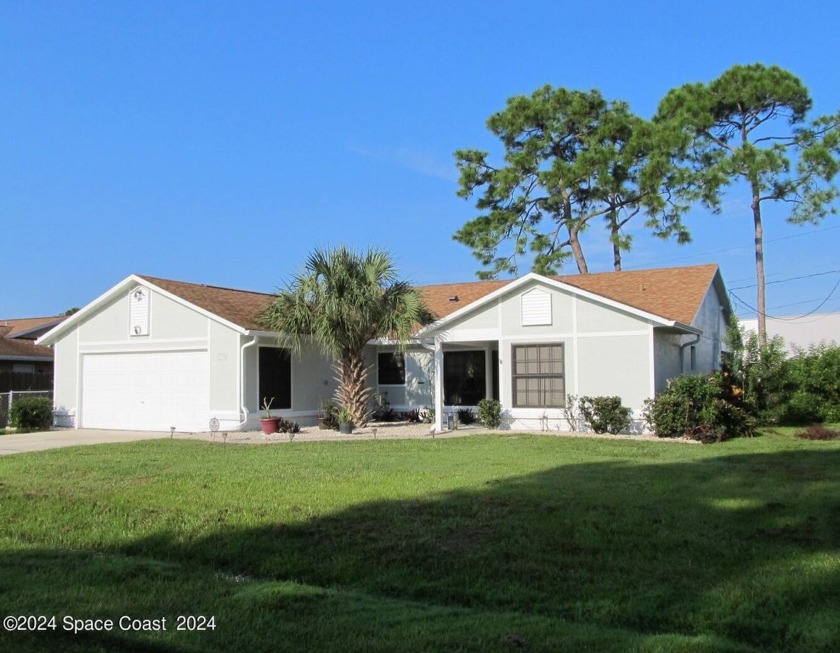 Location, location, location! THIS HOME IS PRICED TO SELL! - Beach Home for sale in Palm Bay, Florida on Beachhouse.com