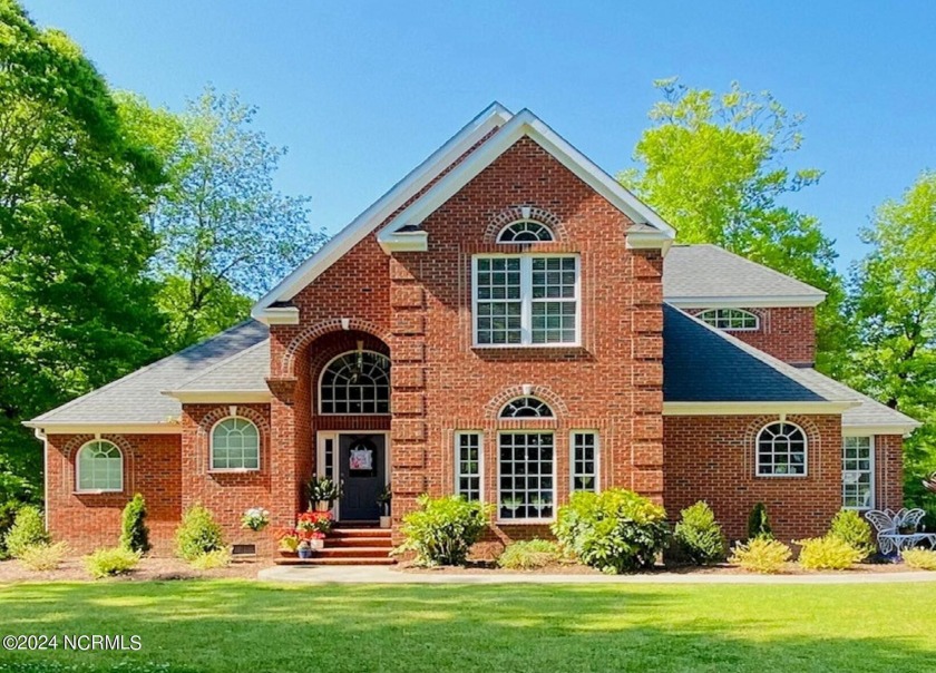 Discover luxury living in this custom brick house, nestled in - Beach Home for sale in Merry Hill, North Carolina on Beachhouse.com