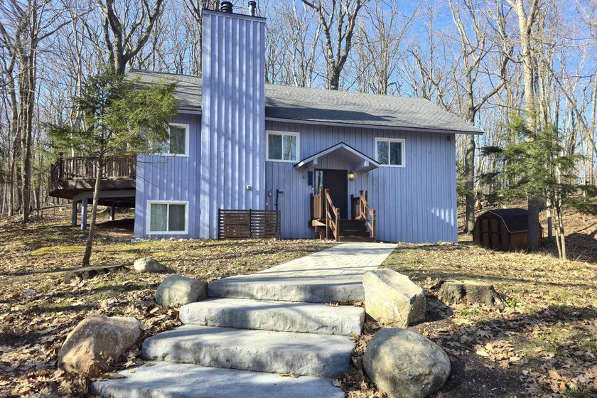 Discover the perfect blend of modern sophistication and 'up - Beach Home for sale in Harbor Springs, Michigan on Beachhouse.com
