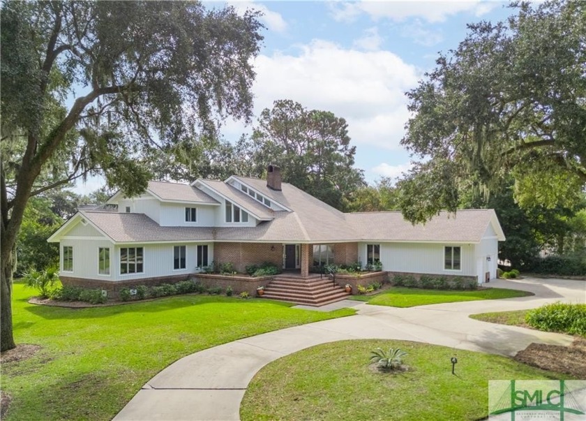 Welcome to this exquisite 3,893 sq. ft. retreat nestled on a - Beach Home for sale in Savannah, Georgia on Beachhouse.com