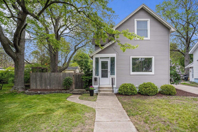 Welcome to this beautifully updated home nestled in a desirable - Beach Home for sale in Grand Haven, Michigan on Beachhouse.com