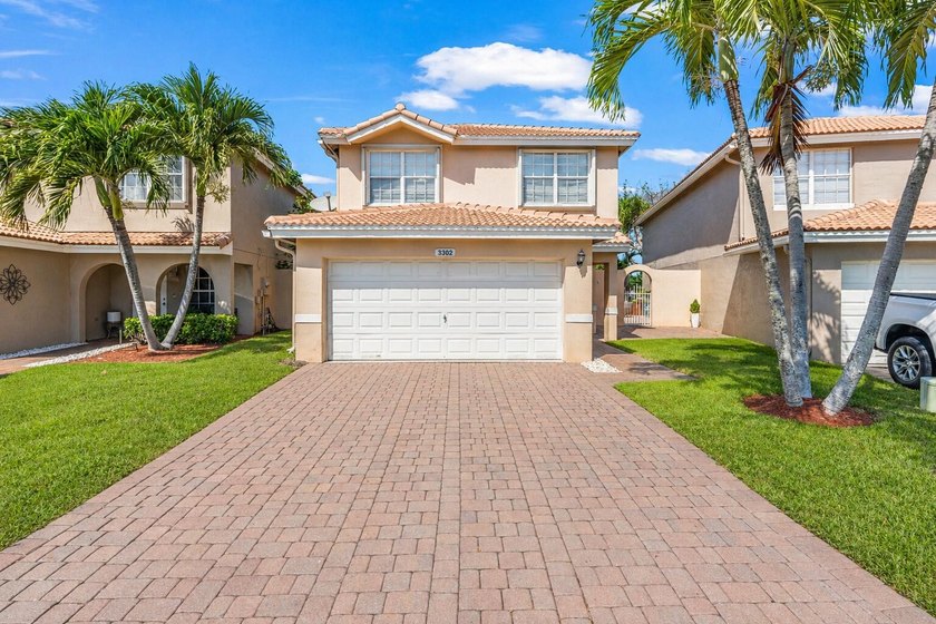 Lakefront 3 bedroom, 2.5 bathroom home located in the gated - Beach Home for sale in West Palm Beach, Florida on Beachhouse.com