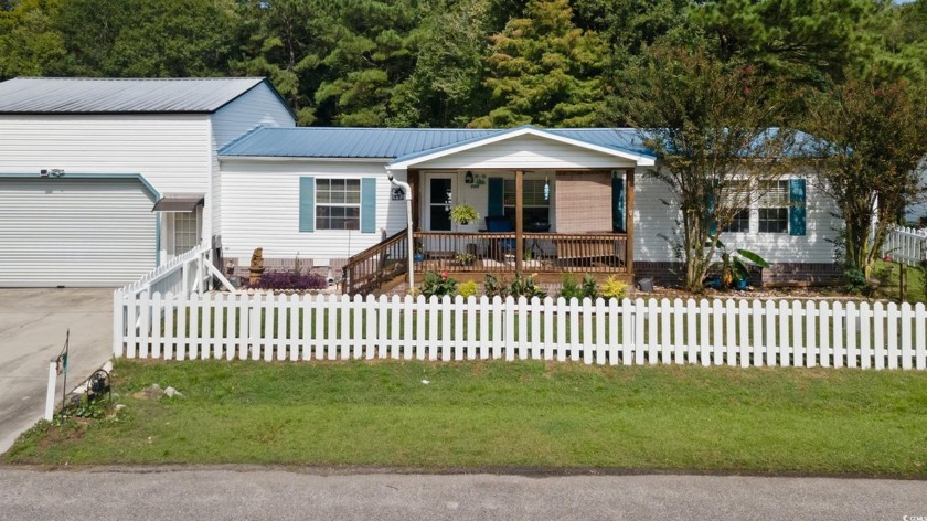 Looking for low maintenance living and a golf cart ride to the - Beach Home for sale in Murrells Inlet, South Carolina on Beachhouse.com