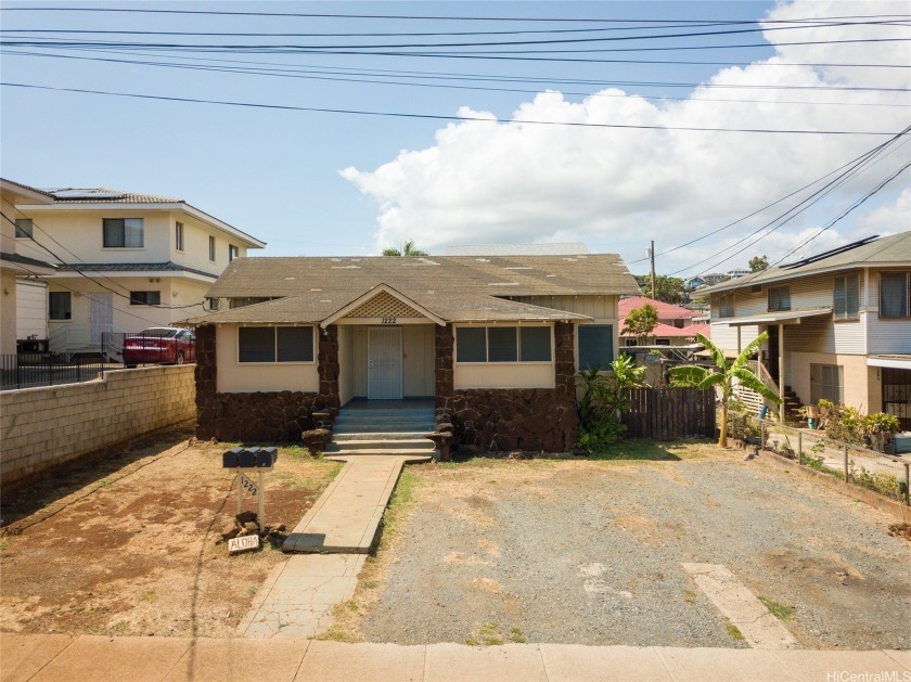 Seize this rare opportunity to own two detached homes with 3 - Beach Acreage for sale in Honolulu, Hawaii on Beachhouse.com