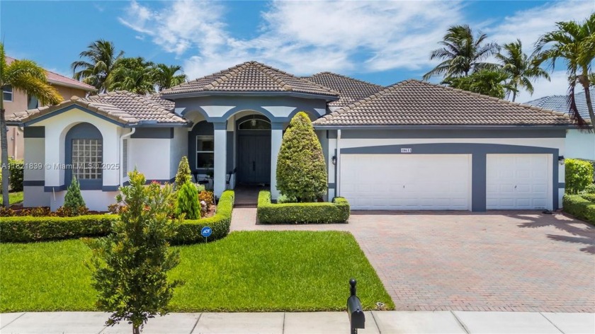 Welcome to this beautiful 5-bedroom, 3-bath lakefront home in - Beach Home for sale in Miramar, Florida on Beachhouse.com