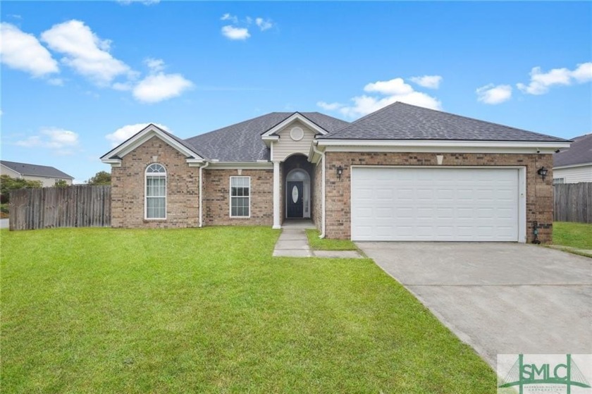 Welcome to this charming 4-bedroom, 2-bathroom home, perfectly - Beach Home for sale in Richmond Hill, Georgia on Beachhouse.com