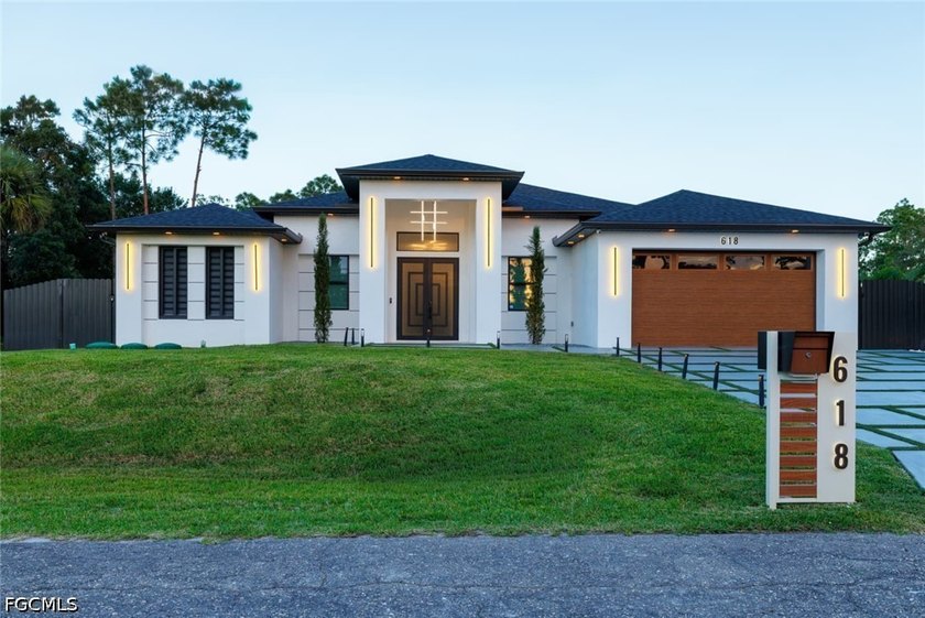 Discover this stunning new construction home situated on a fully - Beach Home for sale in Lehigh Acres, Florida on Beachhouse.com