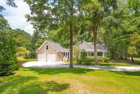 Welcome to this beautiful Lowcountry home situated on over a - Beach Home for sale in Hollywood, South Carolina on Beachhouse.com