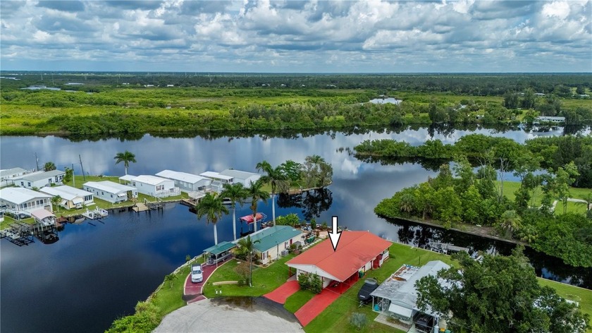Waterfront Living on Shell Creek! This property offer 60 feet of - Beach Home for sale in Punta Gorda, Florida on Beachhouse.com