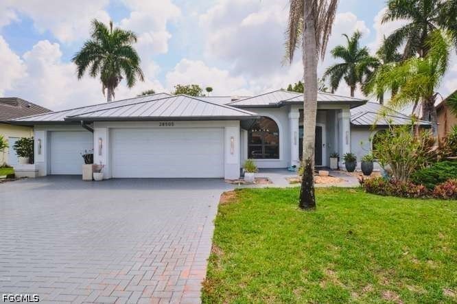 Located in the highly sought-after Spanish Wells community, this - Beach Home for sale in Bonita Springs, Florida on Beachhouse.com