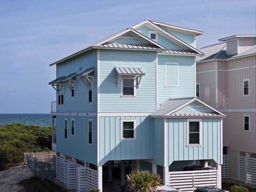 Prepare to be wowed by this stunning Gulf-front luxury home on - Beach Home for sale in St. George Island, Florida on Beachhouse.com