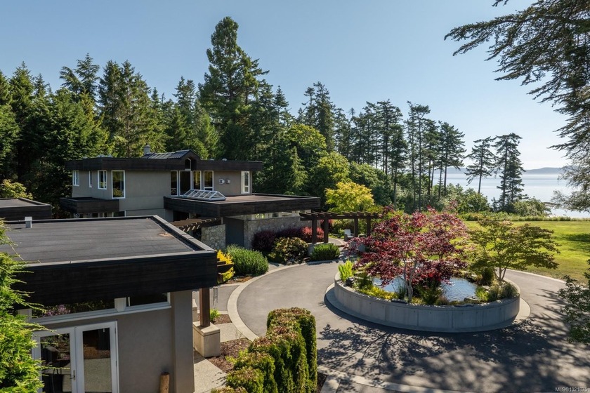 Experience unparalleled beachfront living on the prestigious - Beach Home for sale in Saanich,  on Beachhouse.com
