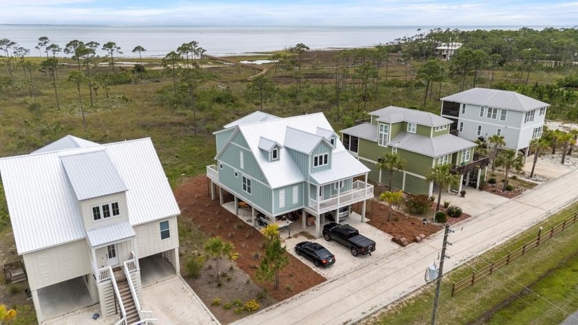 Experience coastal living at its finest with this stunning - Beach Home for sale in Port St Joe, Florida on Beachhouse.com