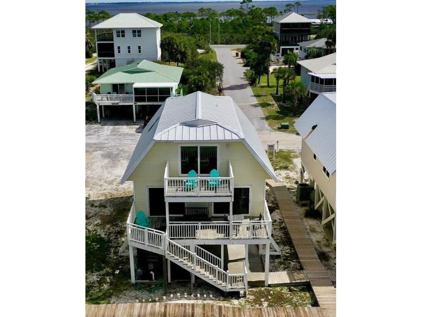 THE BEACH IS LITERALLY YOUR BACKYARD AT THIS GULF-FRONT GEM ON - Beach Home for sale in Port St Joe, Florida on Beachhouse.com
