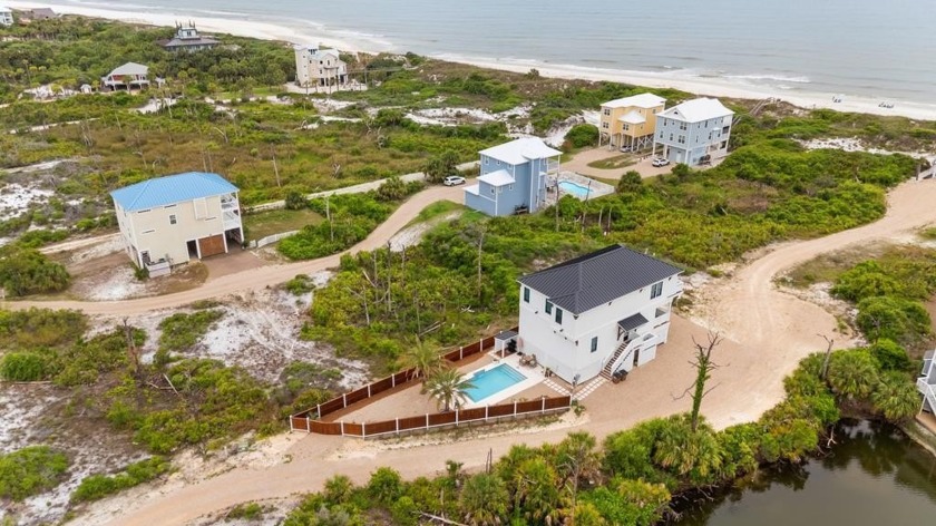 Welcome to 185 Swirly Sun Drive, a stunning 4-bedroom, 3 - Beach Home for sale in Cape San Blas, Florida on Beachhouse.com