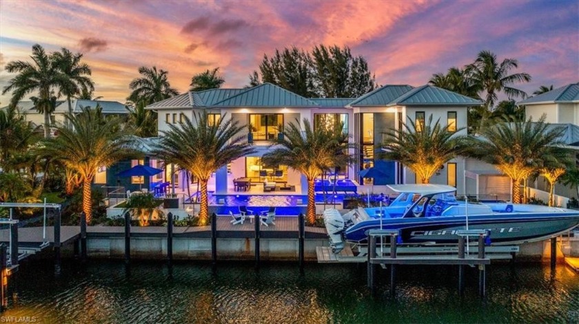 Located in the direct waterfront community of Royal Harbor sits - Beach Home for sale in Naples, Florida on Beachhouse.com