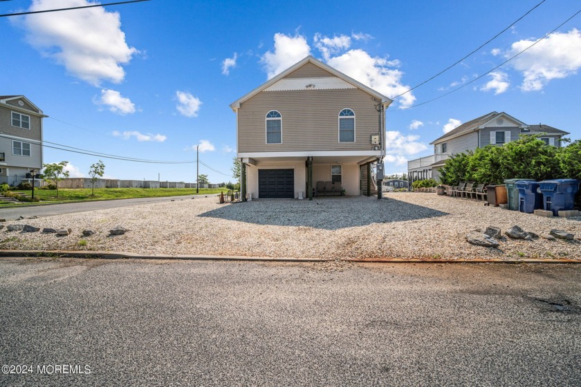 The property boasts three bedrooms, two and a half baths, and is - Beach Home for sale in Little Egg Harbor, New Jersey on Beachhouse.com