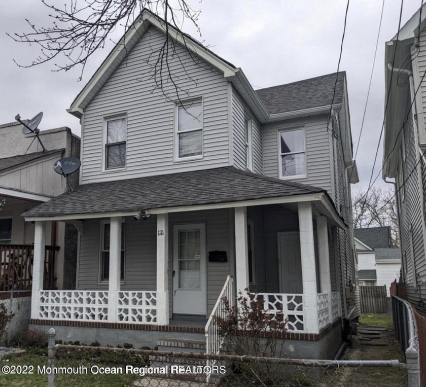 Make this charming two-story house your new home. Featuring 3 - Beach Home for sale in Asbury Park, New Jersey on Beachhouse.com