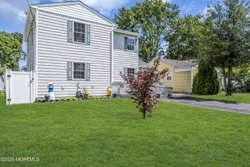 Tucked away on a quiet street in coveted Point Pleasant, this - Beach Home for sale in Point Pleasant, New Jersey on Beachhouse.com