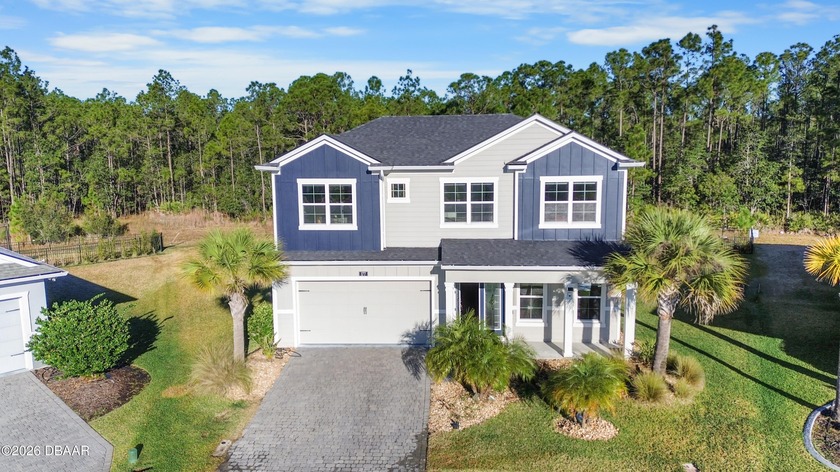 Set on the largest lot in the community, this exceptional home - Beach Home for sale in Daytona Beach, Florida on Beachhouse.com